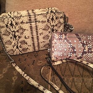 Michael Kors handbag with matching wallet snake pattern in excellent condition.